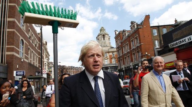 London Mayor Boris Johnson leads cleanup effort after the riots.